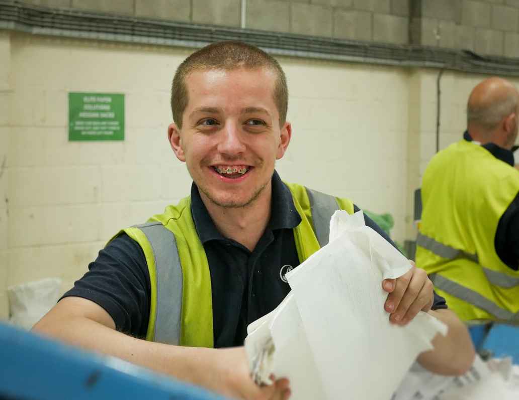 Employee at recycling centre